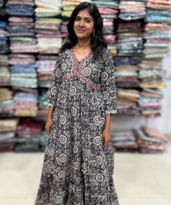 A very beautifully crafted cotton dress has decorated with sequins and gotta patti pattern. It is suitable for both hand wash and machine wash.