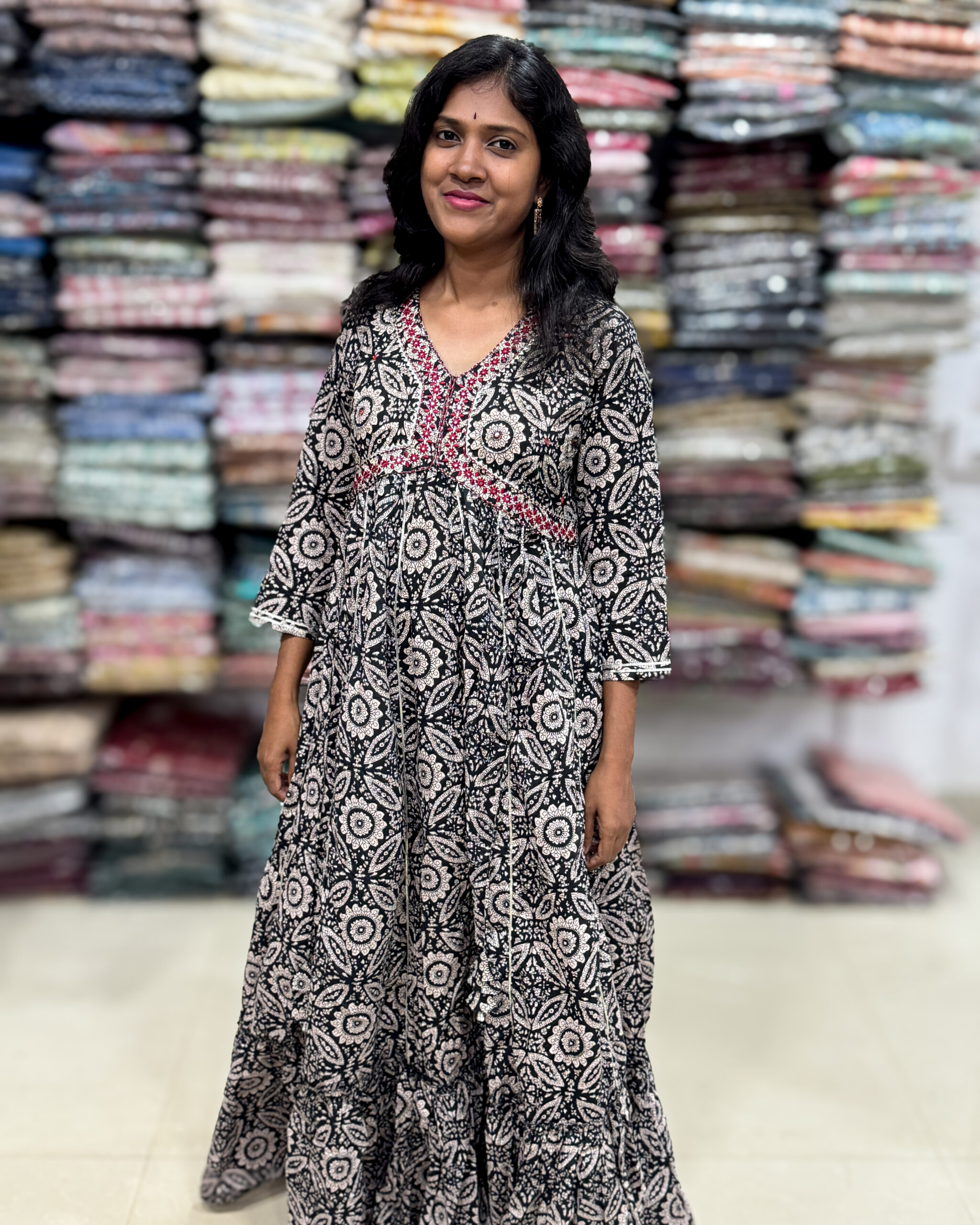 A very beautifully crafted cotton dress has decorated with sequins and gotta patti pattern. It is suitable for both hand wash and machine wash.