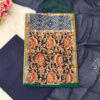 Pure cotton suits has kalamkari printed patch work on the neck patterns with sequins paired with bottom and printed dupatta. It is suitable for both hand wash and machine wash.