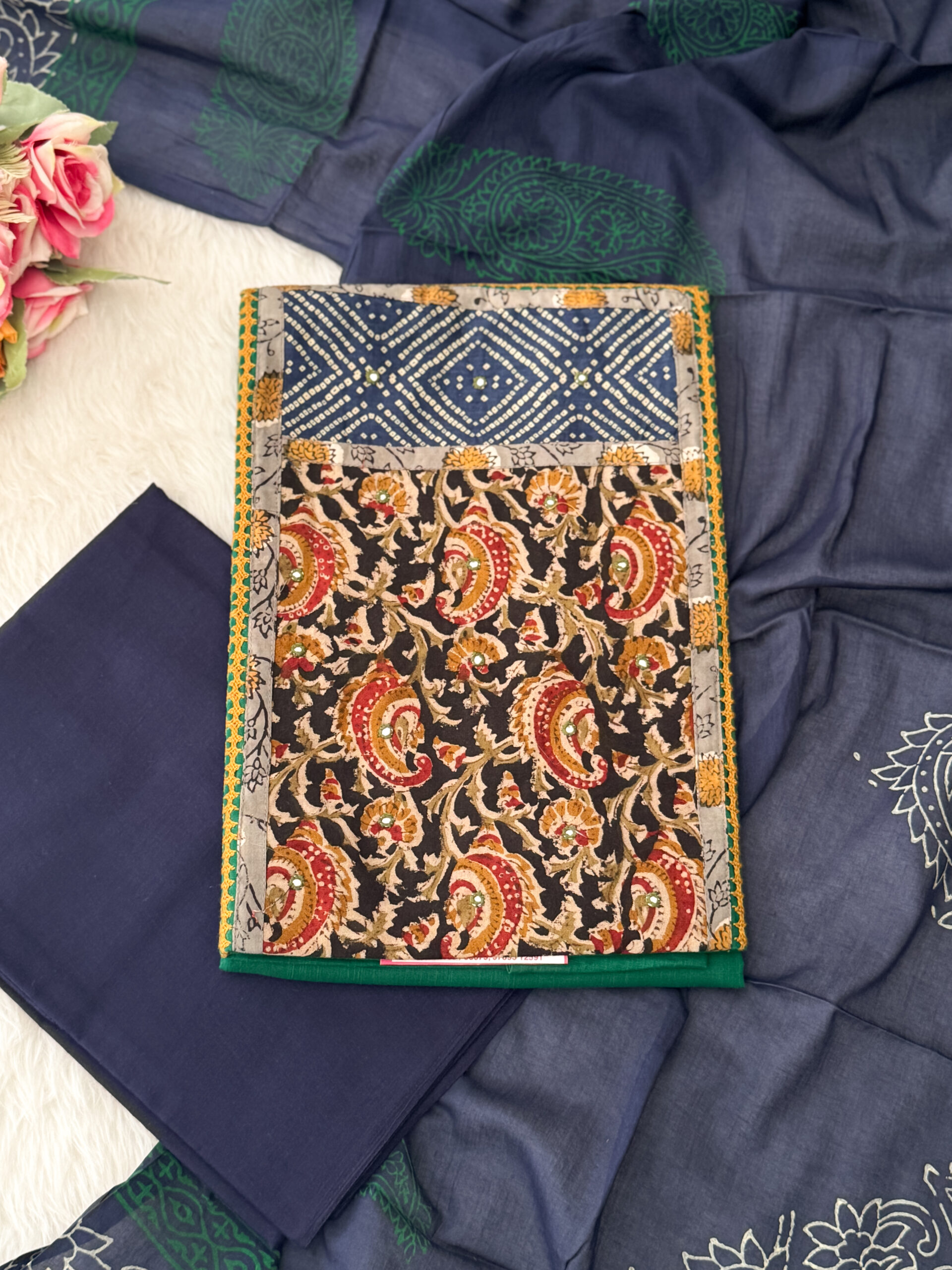 Pure cotton suits has kalamkari printed patch work on the neck patterns with sequins paired with bottom and printed dupatta. It is suitable for both hand wash and machine wash.