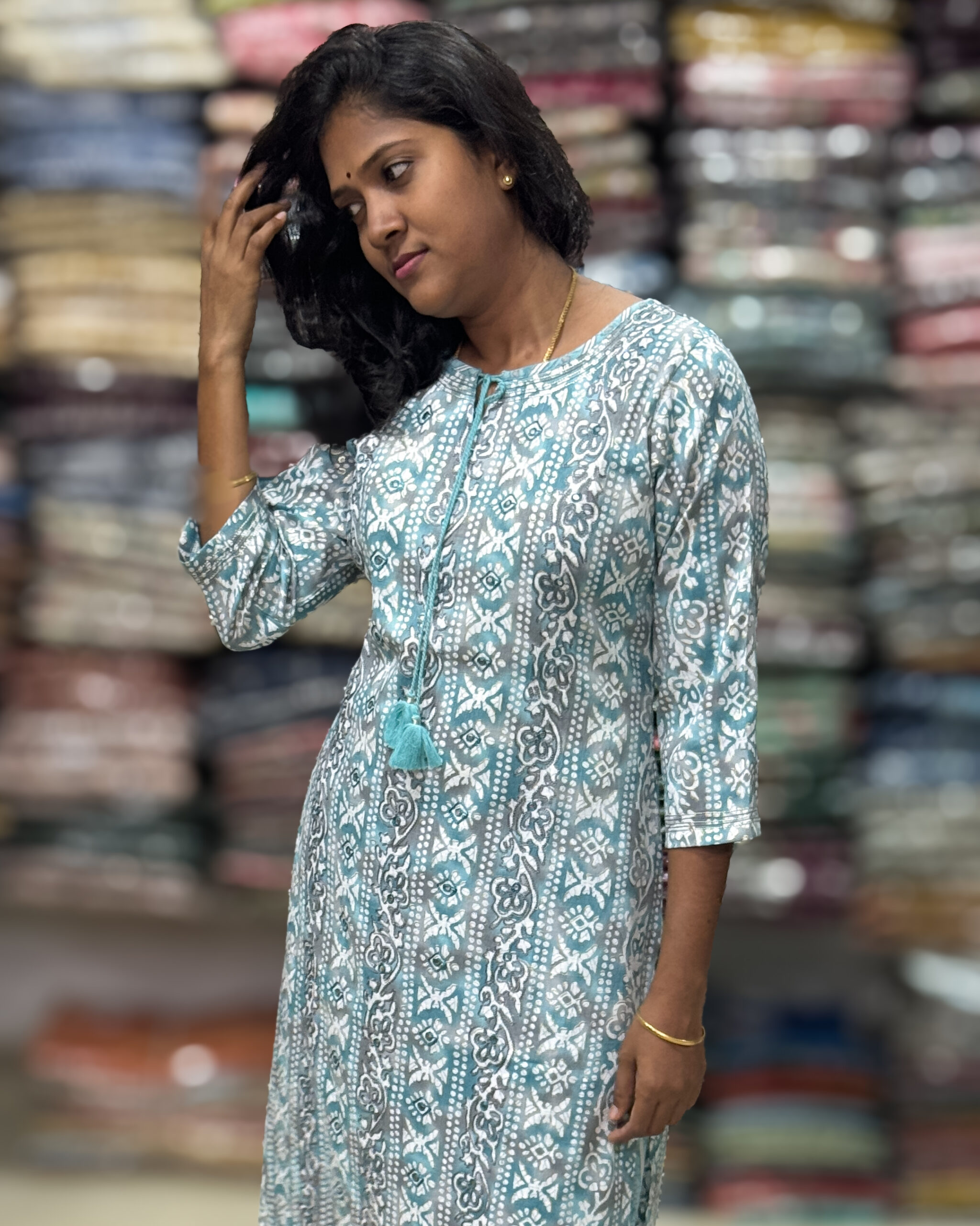 Ethnic foil printed kurta highlighted with embroidery and sequins patterns paired with elastic waist pant. It is suitable for both hand wash and machine wash.