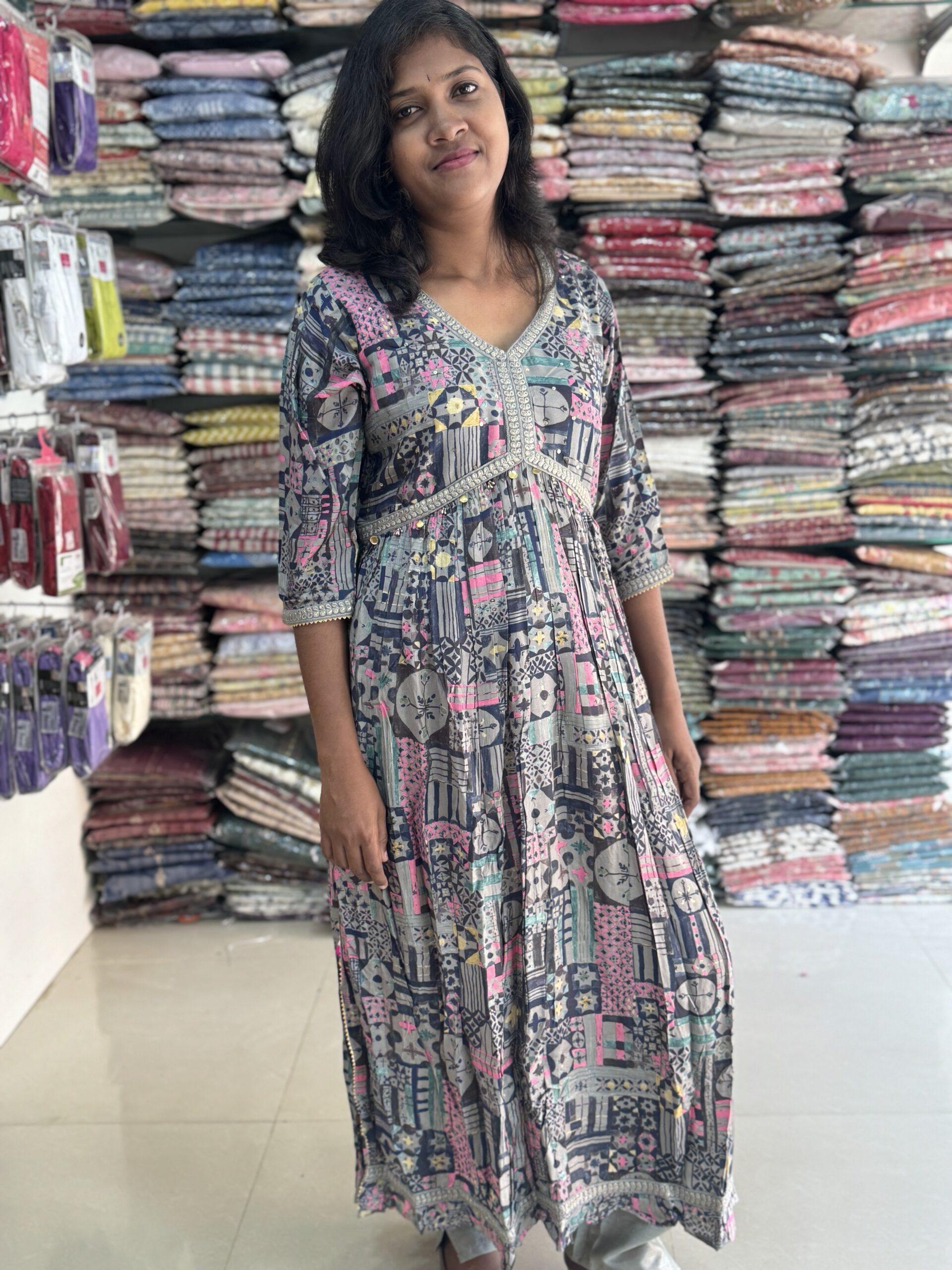 Ethnic Beautiful printed aline flared kurta with lace pattern, sequins and tie up knot in waist comes with pom pom and shells . Paired with santoon elastic waist pant. It is suitable for both hand wash and machine wash.