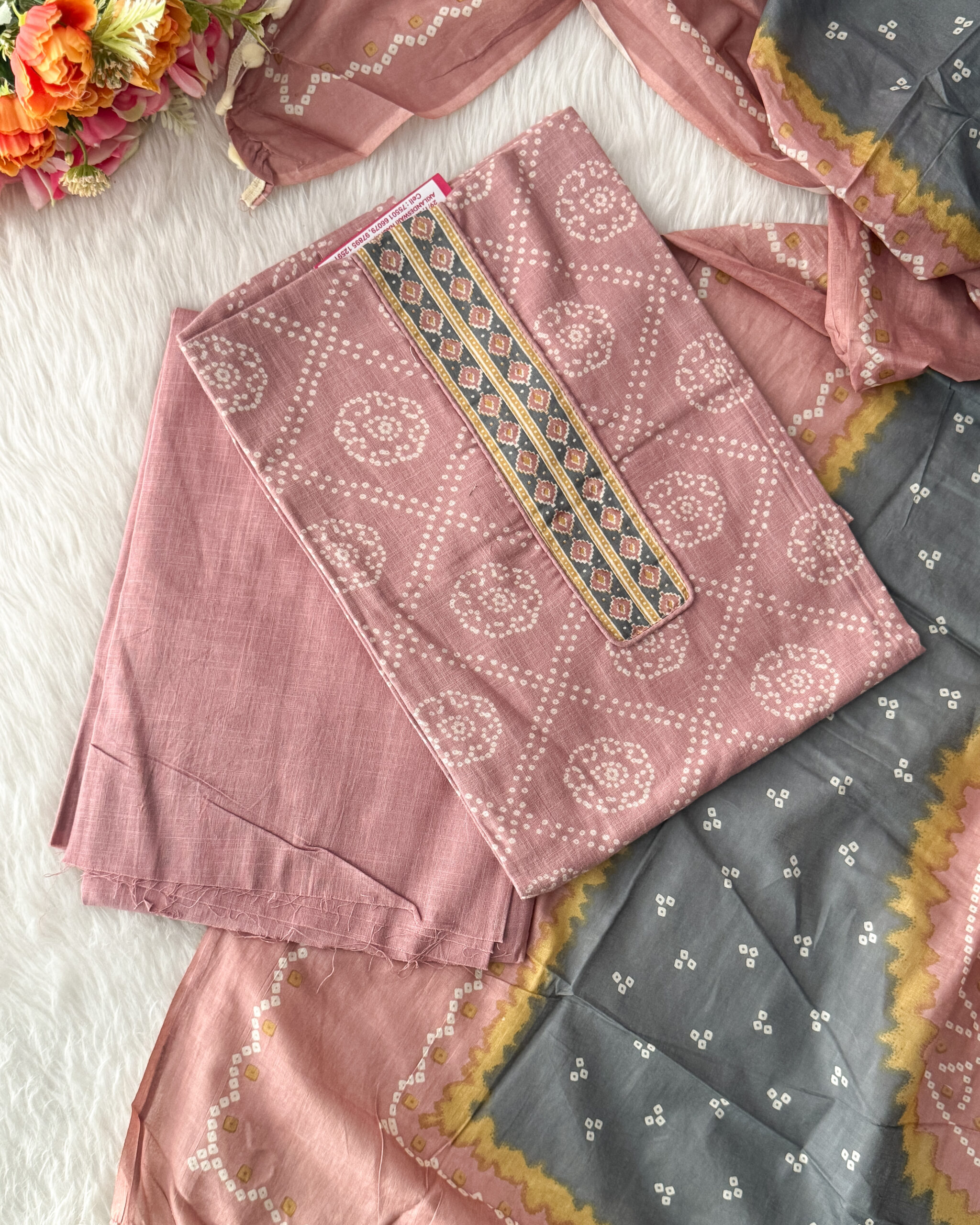 Ethnic bandhani printed pure cotton material with neck pattern comes with plain bottom and printed dupatta with pompom. It is a perfect choice for causal wear. It is suitable for both hand wash and machine wash.