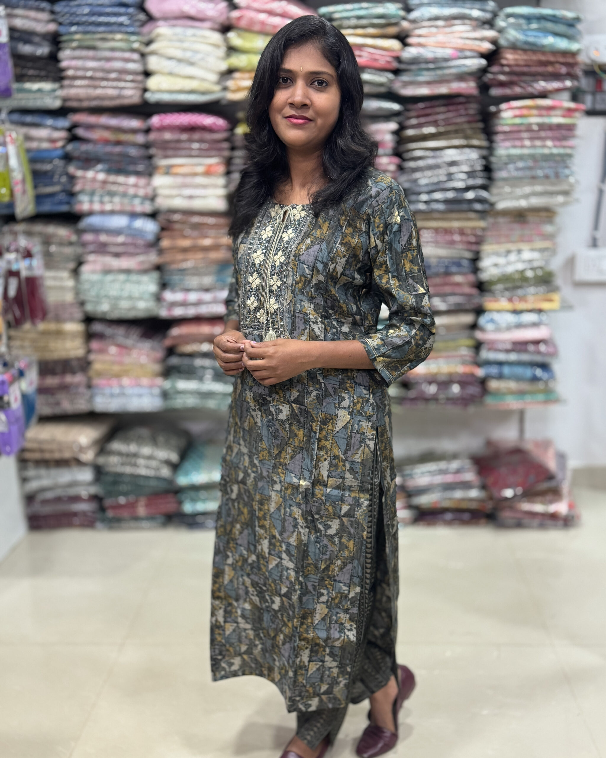 Ethnic Beautiful Geometrical printed staright kurta embellished with floral embroidery and sequins patterns has foil prints paired with elastic waist pant. It is suitable for both hand wash and machine wash.