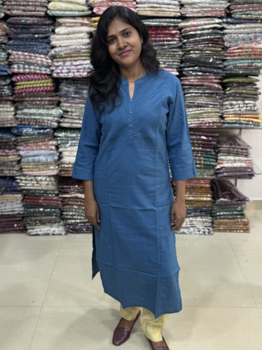Beautiful cotton plain kurti with yoke patterns and decorative buttons. Perfect choice for casual wear. 