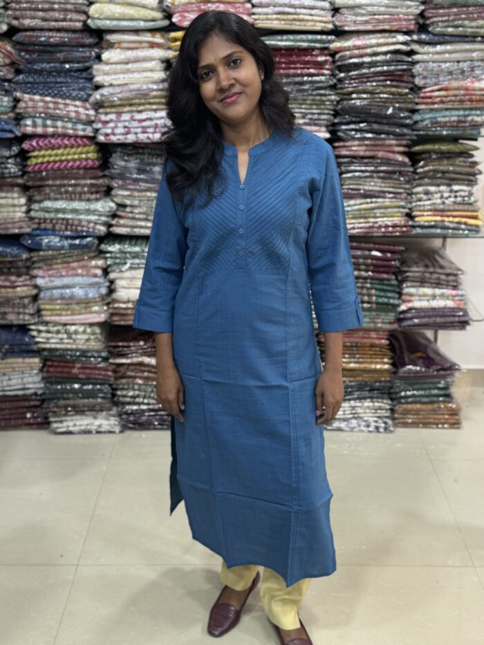 Beautiful cotton plain kurti with yoke patterns and decorative buttons. Perfect choice for casual wear. 