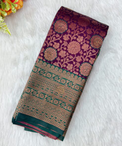 Beautiful silk saree with floral zari weaves and stones comes with contrast border, blouse and pallu.