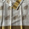 Beautiful tussar cotton saree with leaf design and golden zari border with running blouse.