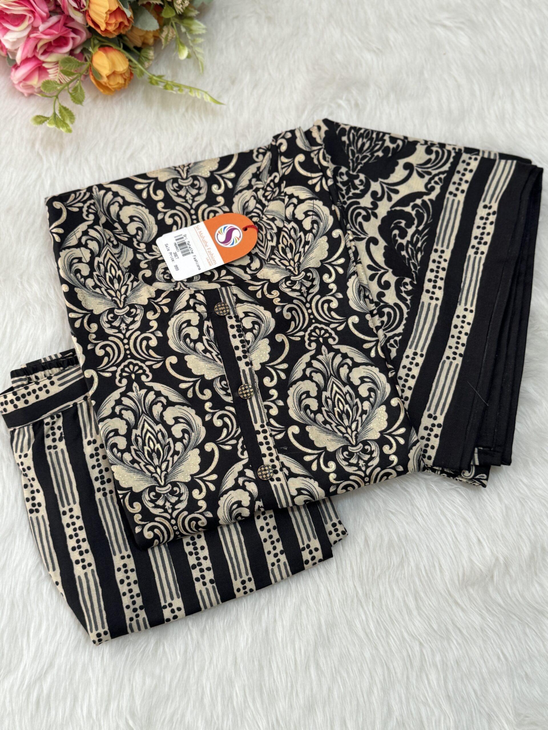 Cotton suits designed with foil prints and decorative button plackets comes with elastic regular pant and dupatta 