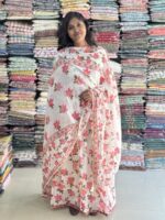 Floral printed soft cotton pleated long top has embroidery and sequins pattern in the yoke comes with elastic waist pant (embroidery in the border) and printed dupatta with laces.