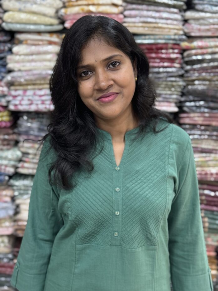 Beautiful cotton plain kurti crafted with yoke patterns and decorative buttons. Perfect choice for casual wear.