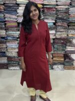 Beautiful cotton plain kurti crafted with yoke patterns and decorative buttons. Perfect choice for casual wear.