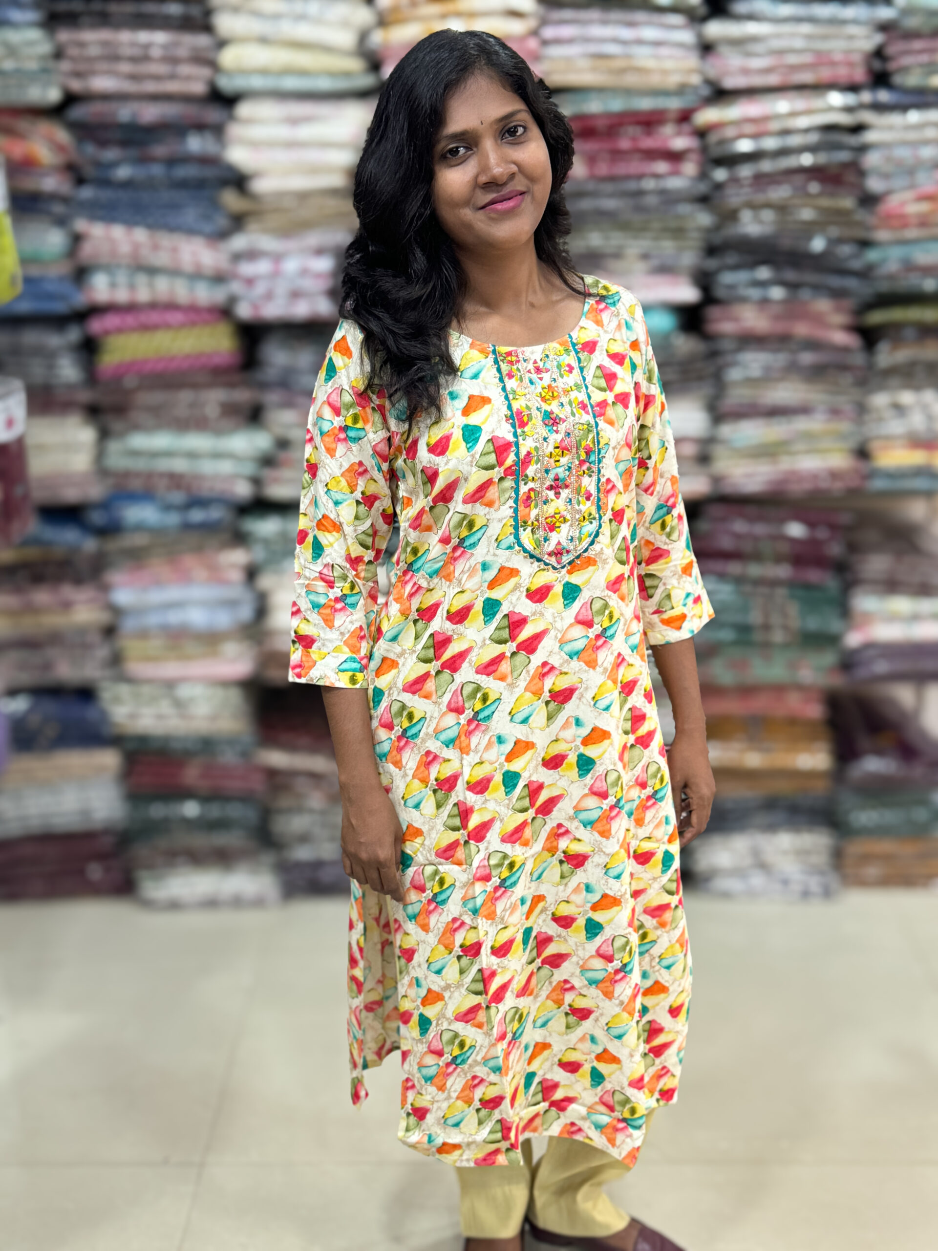 Beautiful rayon kurti has foil prints crafted with embroidery and mirror detailing in the neck patterns. Perfect choice for casual wear. 