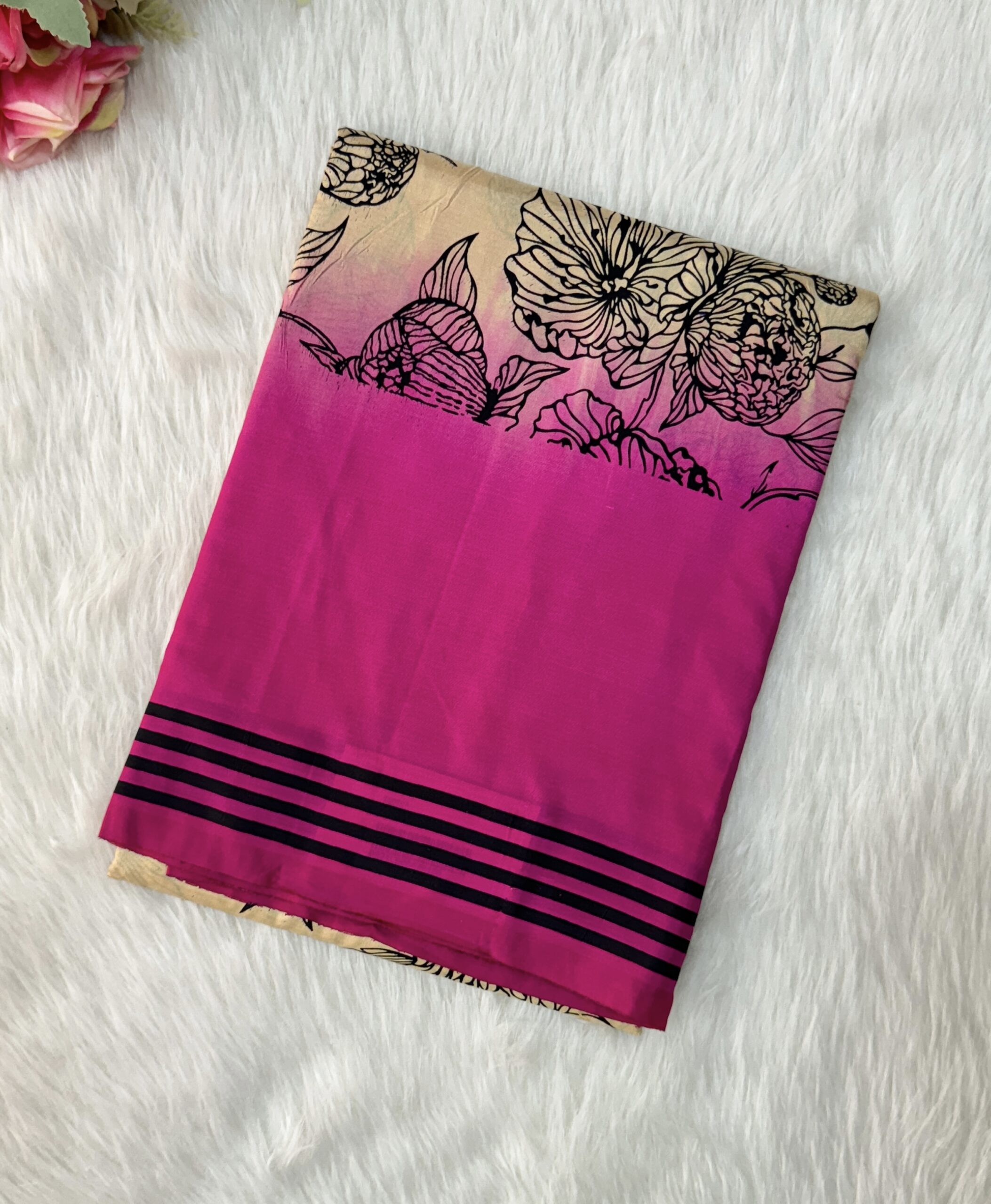 Beautiful crepe silk saree with floral designs with contrast  border and blouse.