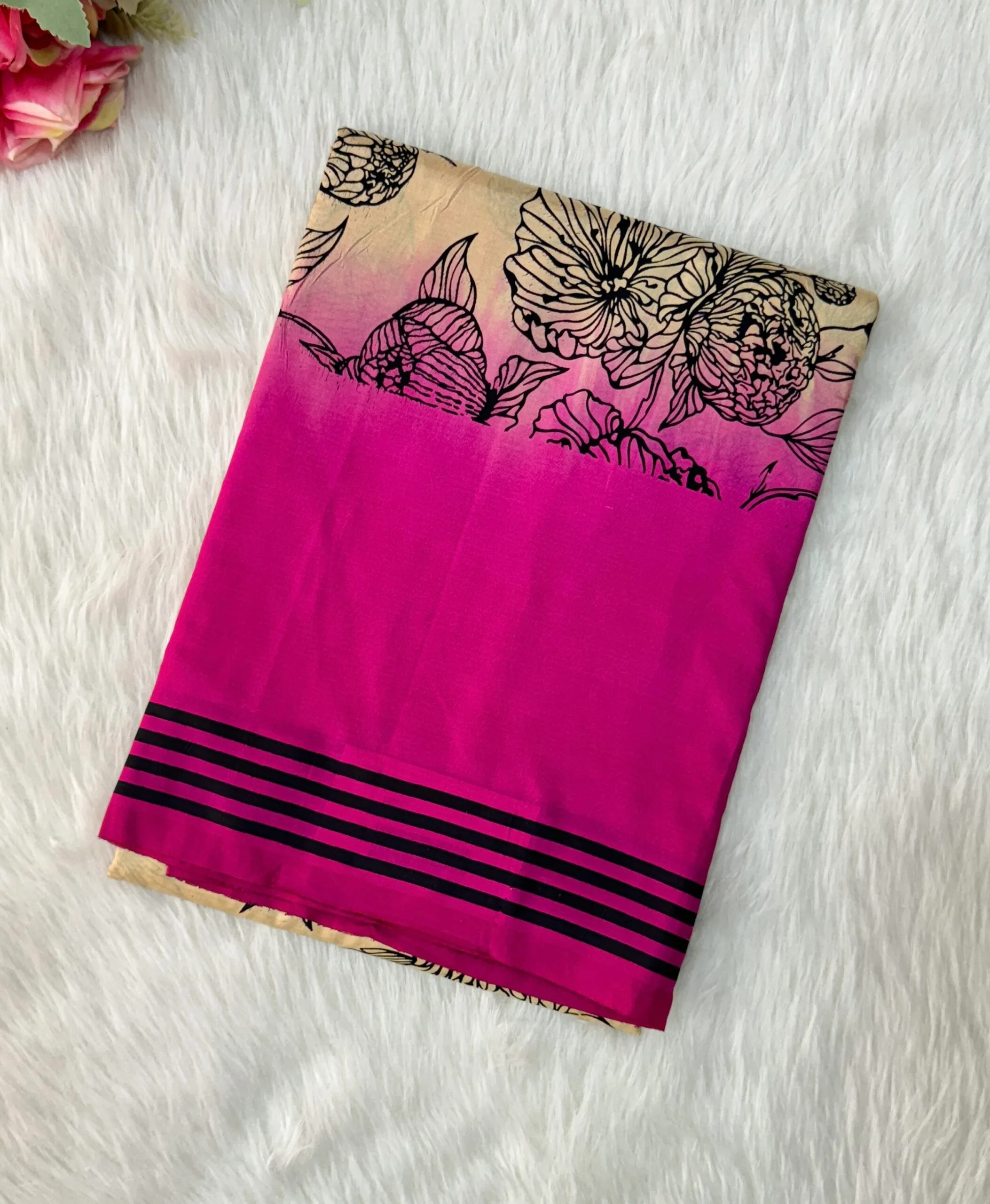 Beautiful crepe silk saree with floral designs with contrast  border and blouse.