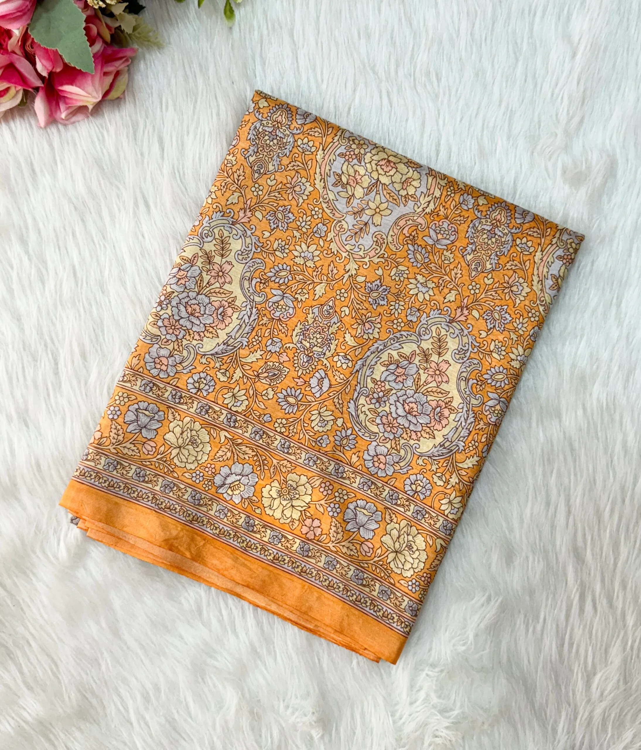 Beautiful crepe silk saree with floral designs with contrast  blouse.