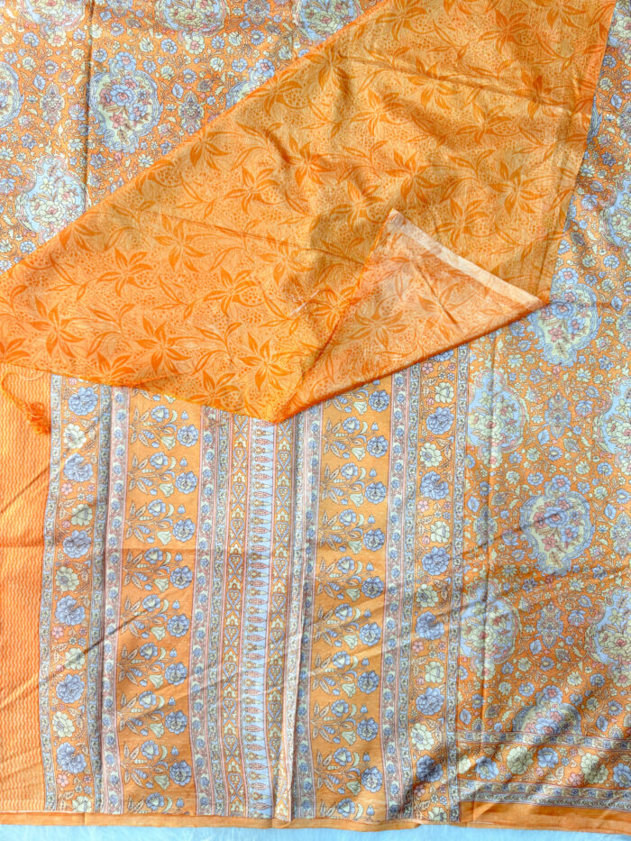 Beautiful crepe silk saree with floral designs with contrast  blouse.