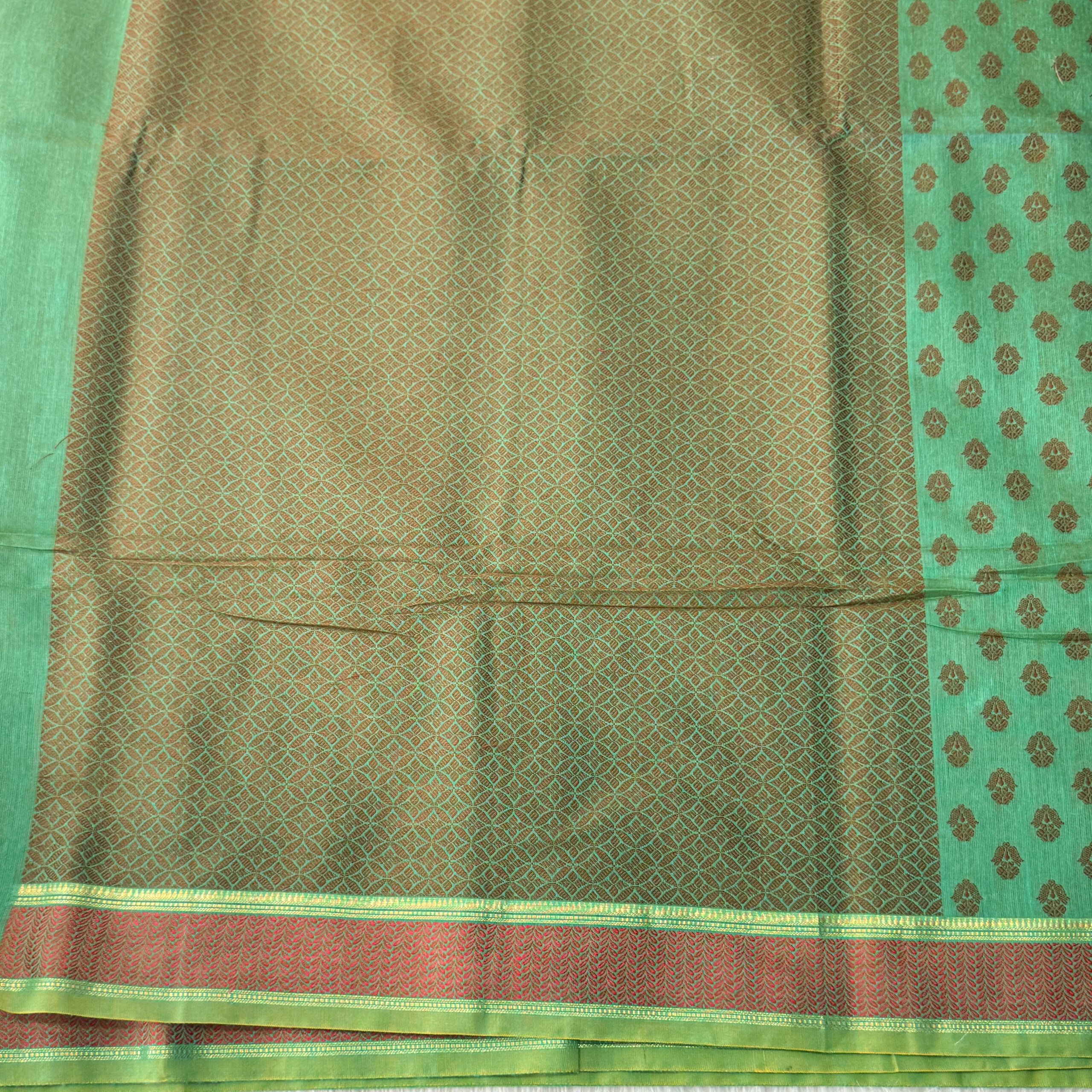 Beautiful cotton saree butta design with zari border and blouse.
