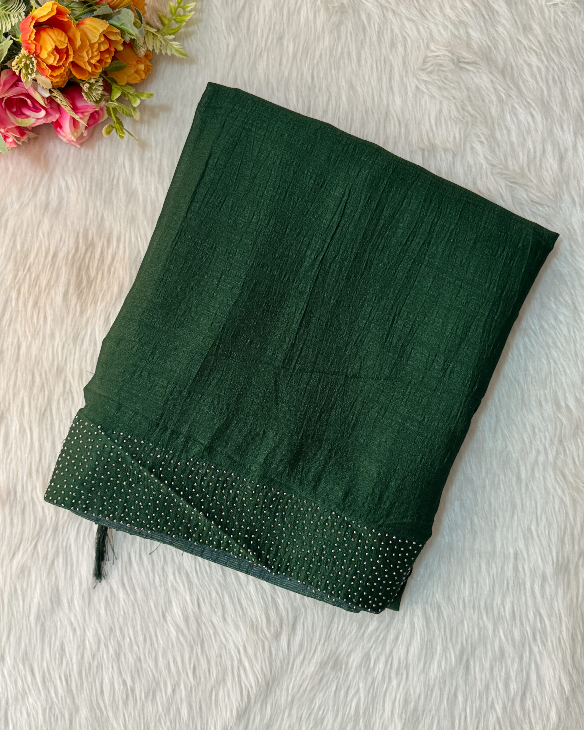 A beautiful printed saree has a banarasi border comes with blouse and pallu with tassels.