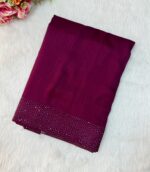A beautiful printed saree has a white stone border comes with blouse and pallu with tassels.