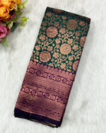 Beautiful silk saree with floral zari weaves and stones comes with contrast border, blouse and pallu.