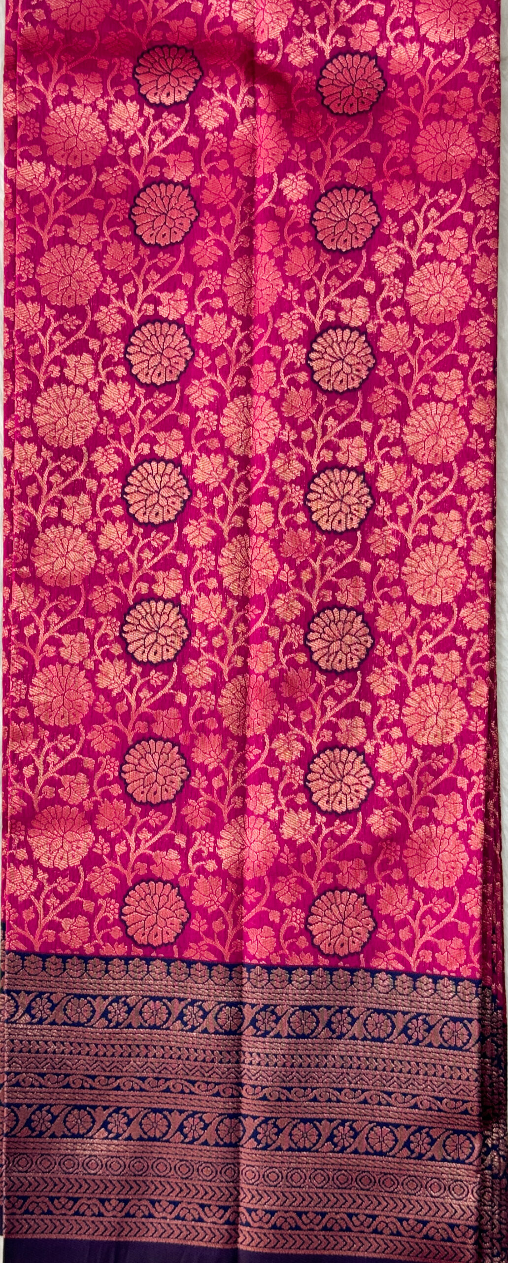 Beautiful silk saree with floral zari weaves and stones comes with contrast border, blouse and pallu.