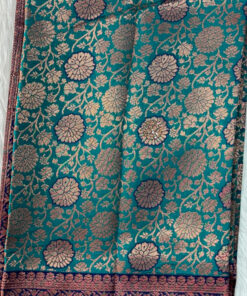 Beautiful silk saree with floral zari weaves and stones comes with contrast border, blouse and pallu.