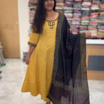 Radiant Yellow A-Line Kali Cotton Salwar Set with Mirror Work & Dupatta for women